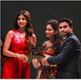 OGEN Infosystem team receiving an industry award